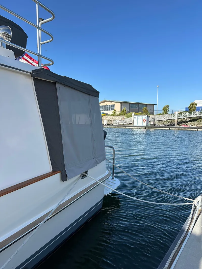 Slide: The Image of 1999 Cherubini Independence 50 yacht docked at marina. - 6