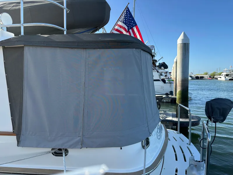 Slide: The Image of 1999 Cherubini Independence 50 yacht docked with US flag. - 7
