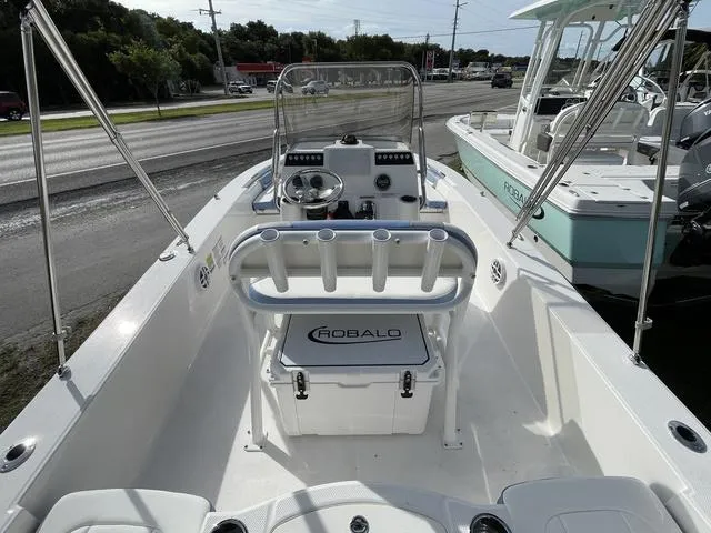 Slide: The Image of 2024 Robalo 206 Cayman boat interior with console and seating. - 10