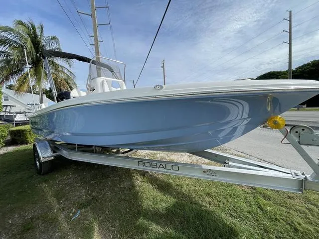 Slide: The Image of 2024 Robalo 206 Cayman boat on a trailer, side view. - 4