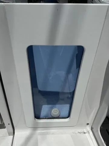 Slide: The Image of 2024 Blackfin 302DC boat interior detail with blue window. - 10