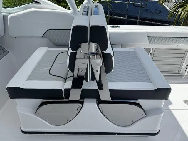 Slide: The Image of 2024 Blackfin 302DC boat seating with modern design and stainless steel accents. - 18