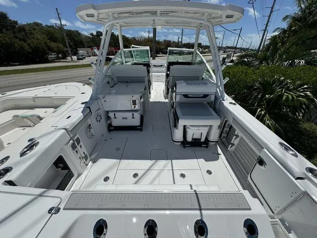 Slide: The Image of 2024 Blackfin 302DC boat interior with seating and storage compartments. - 3