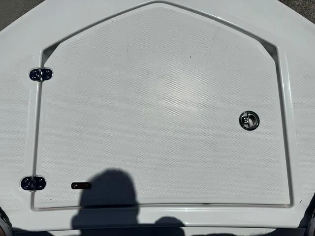 Slide: The Image of 2024 Blackfin 302DC boat deck hatch with latch and hinges. - 36