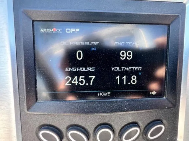 Slide: The Image of 2019 MasterCraft NXT20 dashboard display showing engine hours, temperature, oil pressure, and voltmeter. - 17