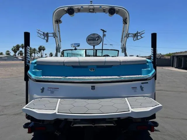 Slide: The Image of 2019 MasterCraft NXT20 boat rear view with swim platform and wakeboard tower. - 7