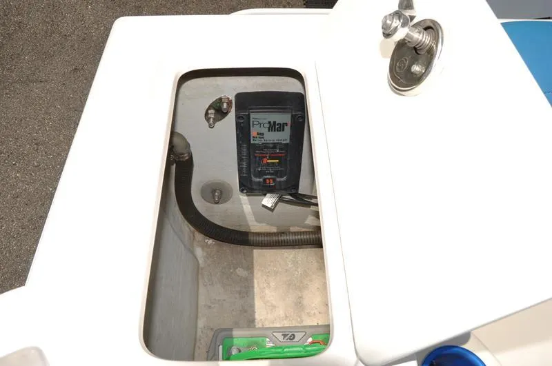 Slide: The Image of 2009 Concept 27' CC boat compartment with ProMariner ProMar battery charger. - 13