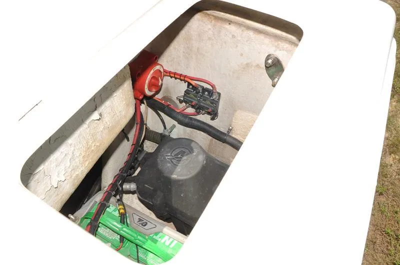 Slide: The Image of 2009 Concept 27' CC boat battery compartment with wiring and components. - 15