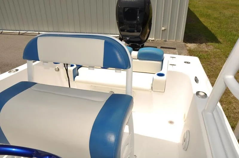 Slide: The Image of 2009 Concept 27' CC boat interior with blue and white seating. - 16