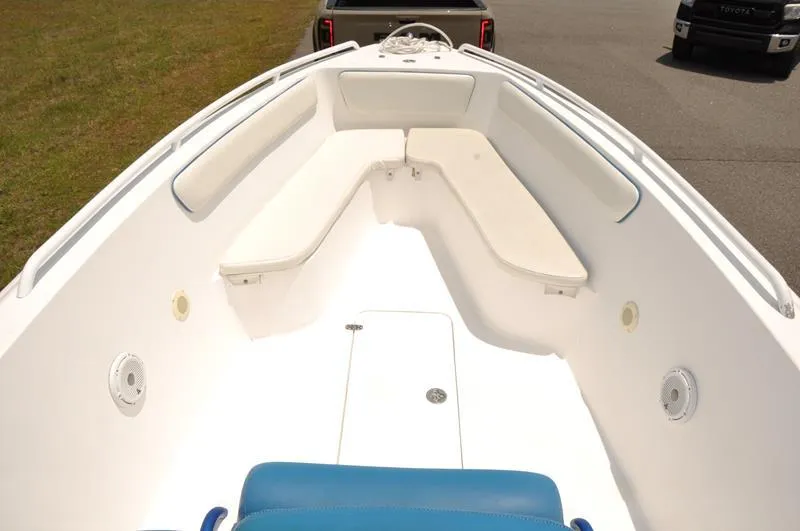 Slide: The Image of 2009 Concept 27' CC boat with white seating and blue accents. - 23
