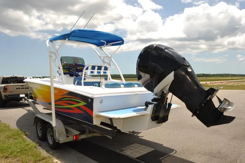 Slide: The Image of 2009 Concept 27' CC boat on trailer with outboard motor. - 4