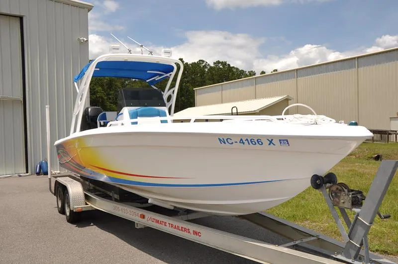 Slide: The Image of 2009 Concept 27' CC boat on trailer outside storage facility. - 7