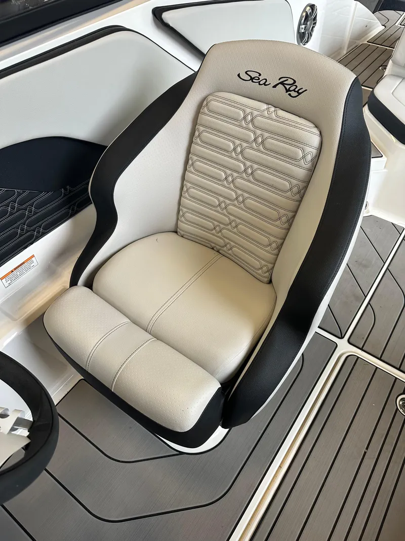 Slide: The Image of 2024 Sea Ray SPX 210 boat seat with elegant design and comfortable upholstery. - 19