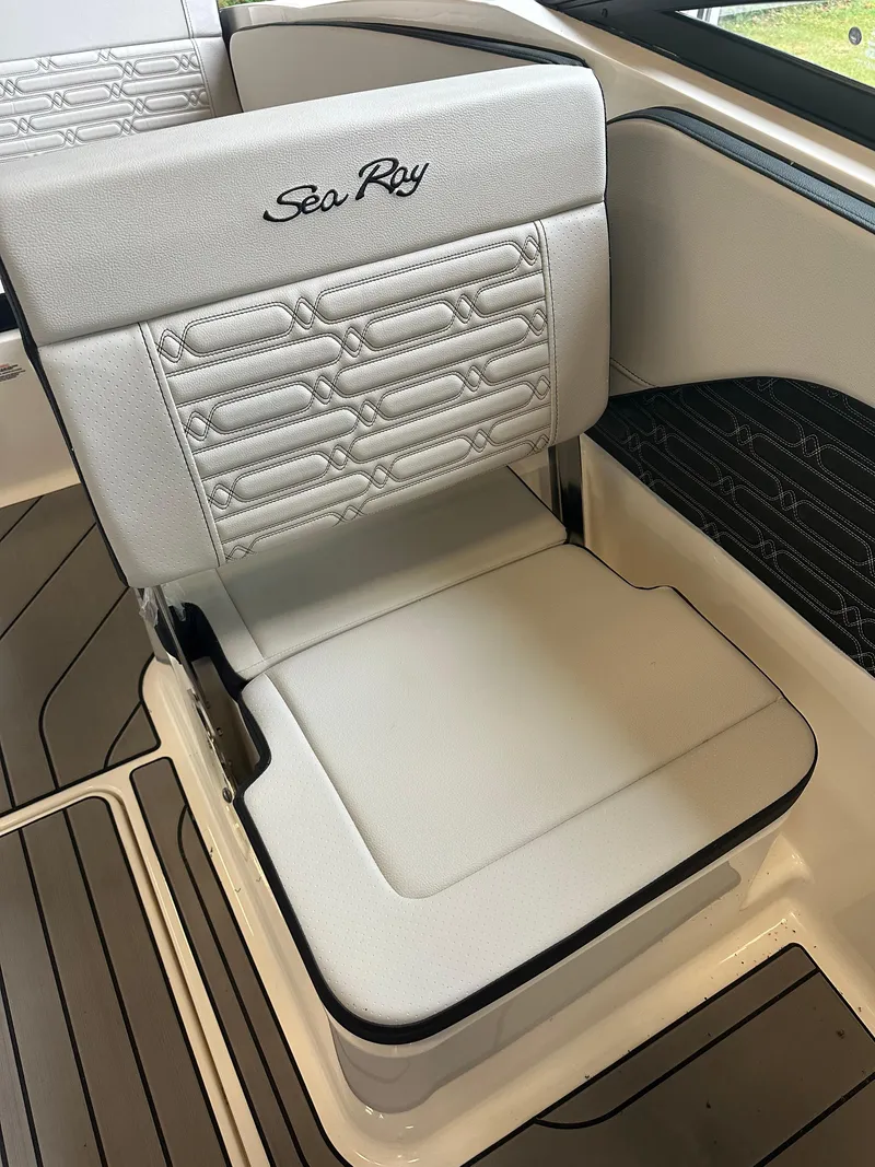 Slide: The Image of 2024 Sea Ray SPX 210 boat seat with elegant white upholstery. - 24