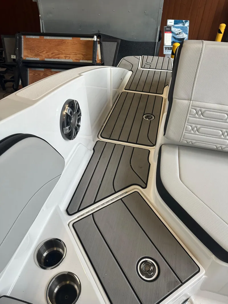 Slide: The Image of 2024 Sea Ray SPX 210 boat interior with sleek seating and modern design. - 8