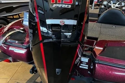 Slide: The Image of 2024 Nitro Z17 boat with a 115 Pro engine, featuring a sleek black and red design. - 2