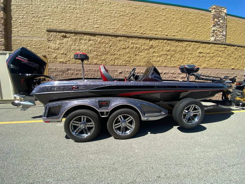 Slide: The Image of 2024 Ranger Z520R Ranger Cup Equipped boat, sleek design, parked outdoors. - 2