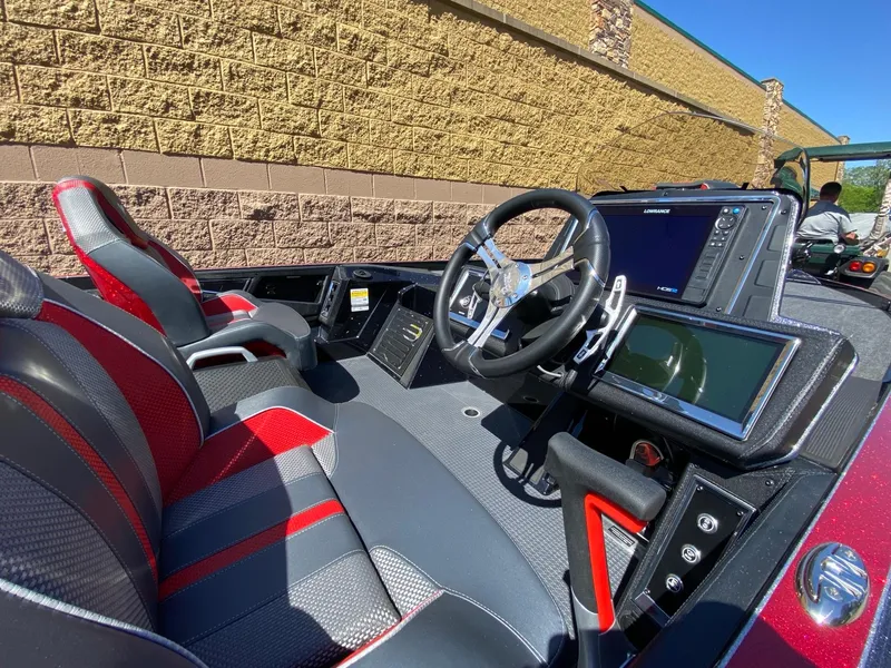 Slide: The Image of 2024 Ranger Z520R boat interior with advanced controls and sleek seating design. - 5