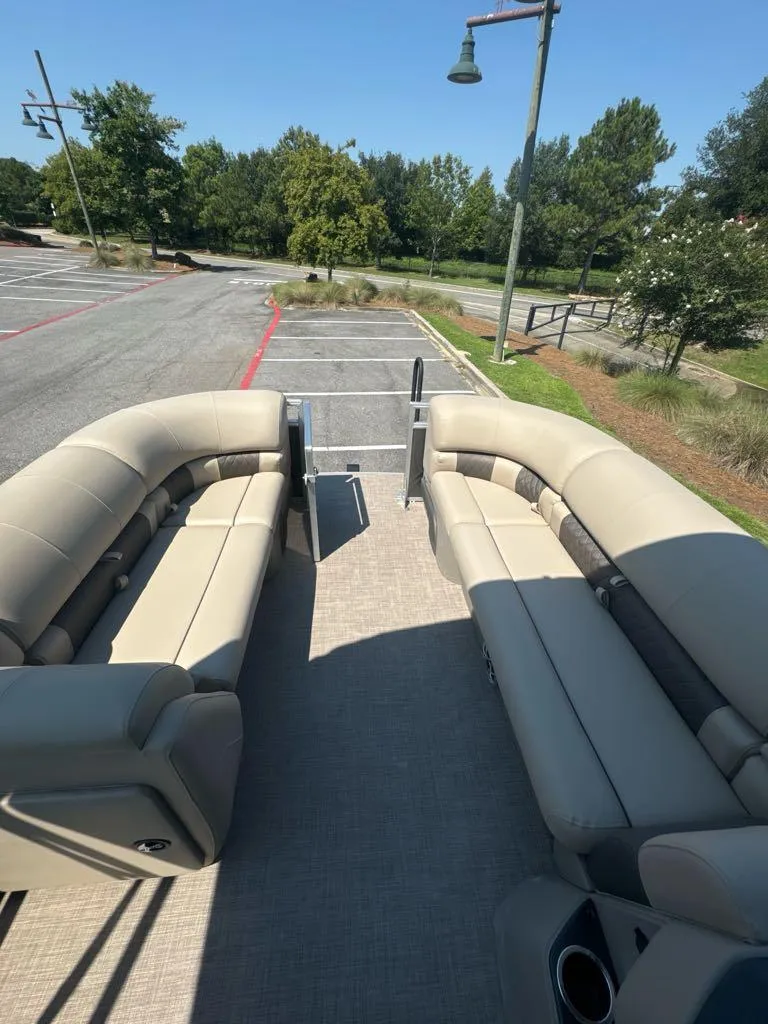 Slide: The Image of 2024 Sun Tracker Party Barge 20 DLX pontoon boat with spacious seating. - 5