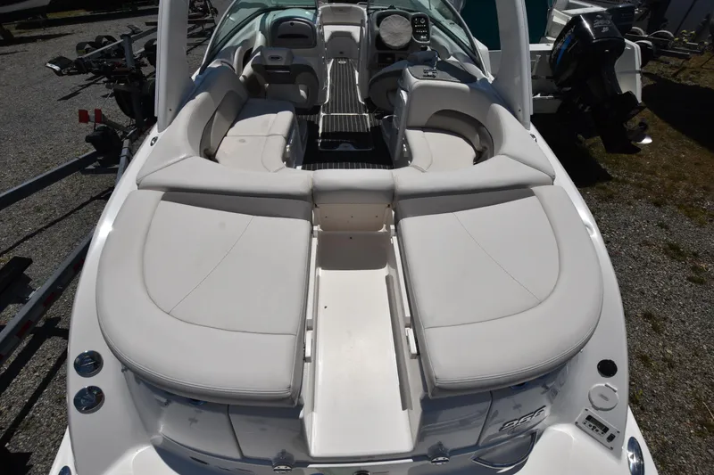 Slide: The Image of 2007 Chaparral 256 SSi boat with spacious seating and modern dashboard. - 4