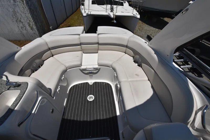 Slide: The Image of 2007 Chaparral 256 SSi boat interior with spacious seating and sleek design. - 7