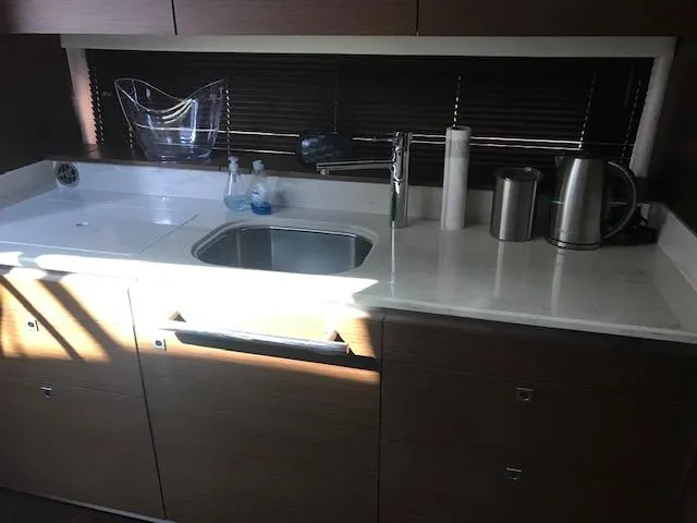 Slide: The Image of Modern kitchen area in a 2013 Sea Ray 470 Sundancer yacht. - 17