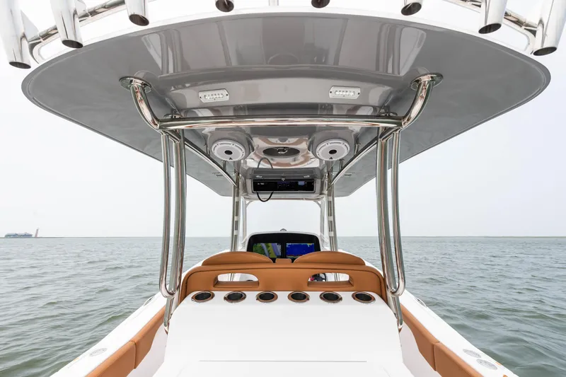 Slide: The Image of 2022 Mag Bay 33cc boat with T-top on open water. - 5