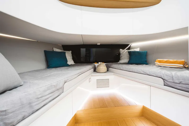 Slide: The Image of Interior cabin of 2019 Bluegame BG62 yacht with twin beds and modern design. - 24