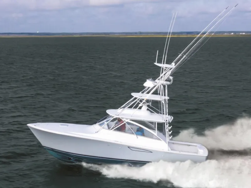 Slide: The Image of 2025 Viking 38 Open Billfish cruising on the ocean. - 11