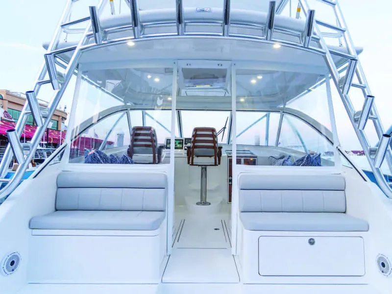 Slide: The Image of 2025 Viking 38 Open Billfish boat interior with seating and helm station. - 8