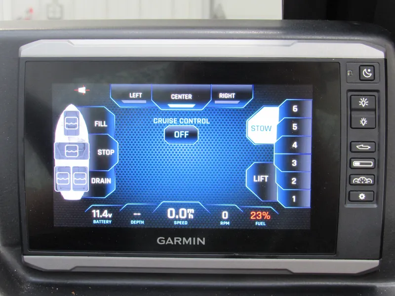 Slide: The Image of Garmin control screen on 2022 Axis A22 boat displaying cruise control and fuel level. - 12
