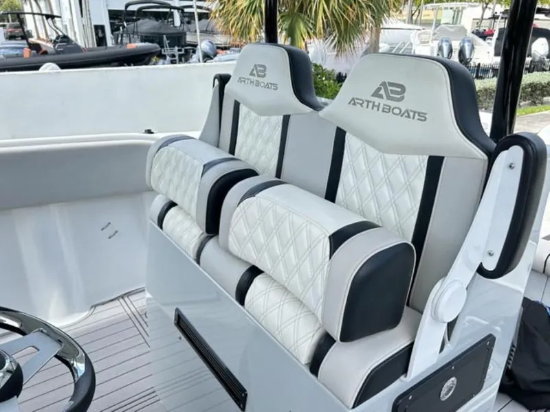 Slide: The Image of Luxury seating on AMP Arth 333 boat, 2023 model, featuring diamond-stitched upholstery. - 11