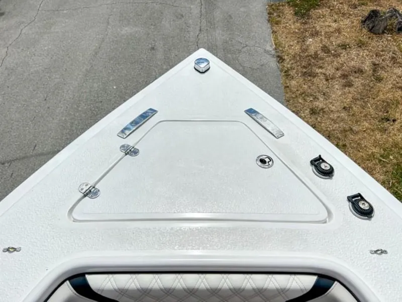 Slide: The Image of Top view of AMP Arth 333 boat's bow, 2023 model, on a concrete surface. - 3