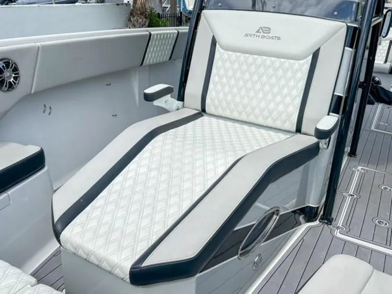 Slide: The Image of Luxurious seating on AMP Arth 333 boat, 2023 model, featuring diamond-stitched upholstery. - 6