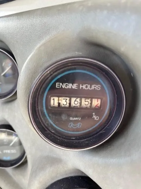 Slide: The Image of Engine hours gauge showing 1365.4 hours on 1986 Silverton 40 Convertible. - 47