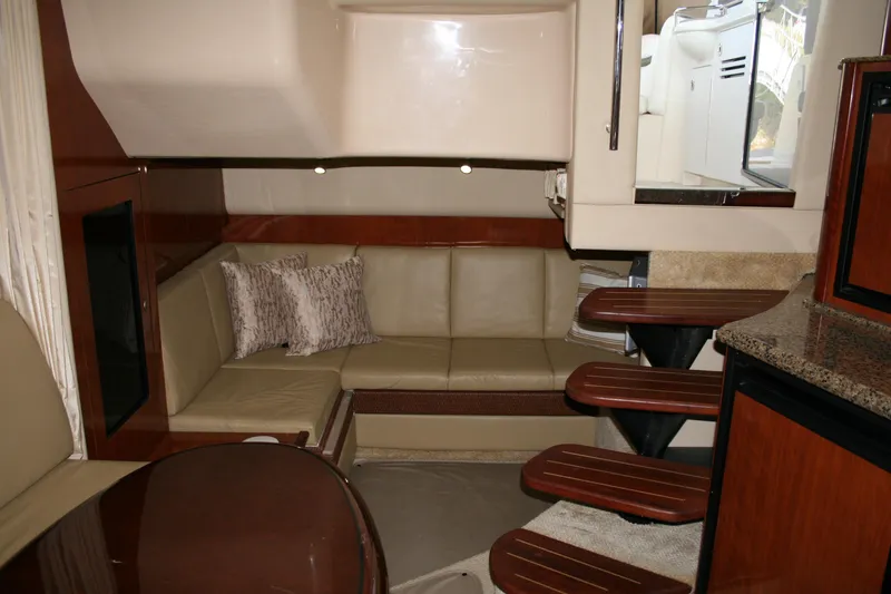 Slide: The Image of Interior of 2006 Sea Ray Sundancer 380 yacht with beige seating and wooden accents. - 14