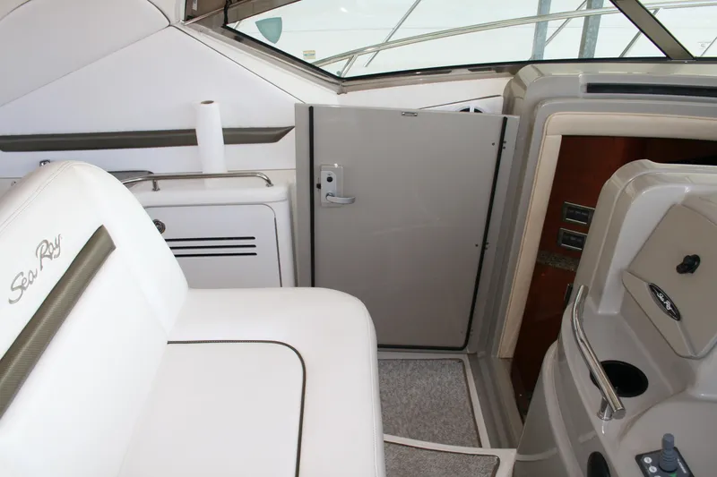 Slide: The Image of Interior of 2006 Sea Ray Sundancer 380 yacht, featuring seating and cabin entrance. - 28