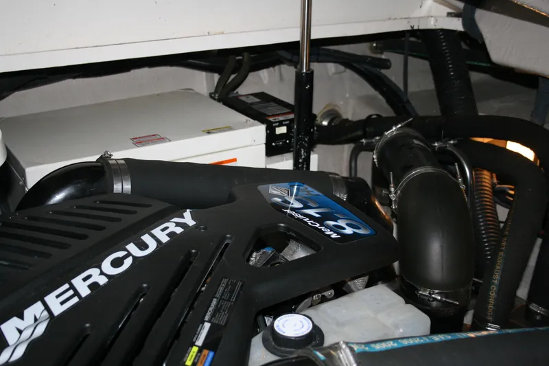 Slide: The Image of Engine compartment of 2006 Sea Ray Sundancer 380 with Mercury V8 engine. - 31