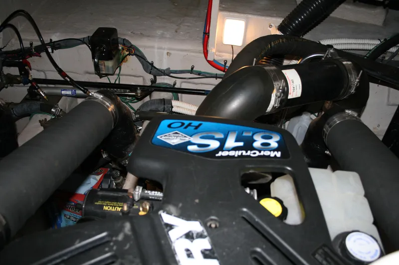 Slide: The Image of Engine compartment of a 2006 Sea Ray Sundancer 380 with MerCruiser components. - 32