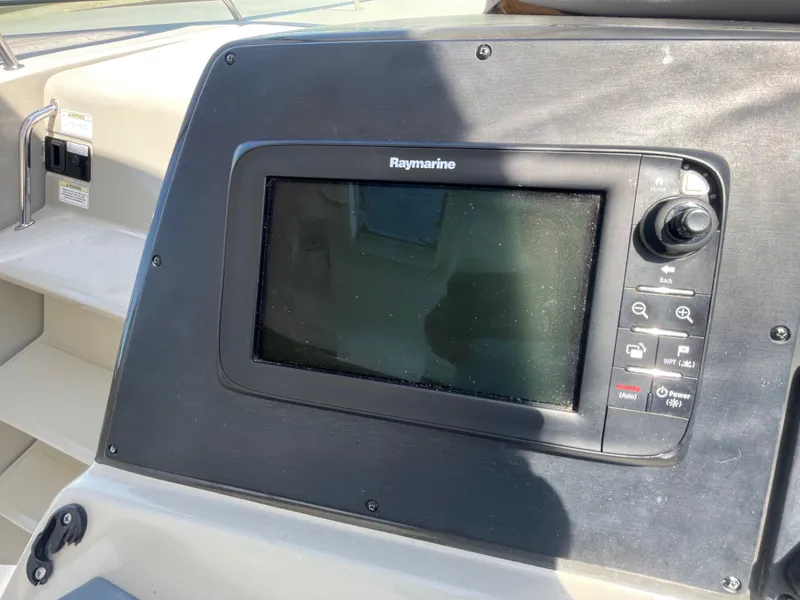 Slide: The Image of Raymarine navigation system on 2014 Sea Ray 370 Sundancer boat. - 25