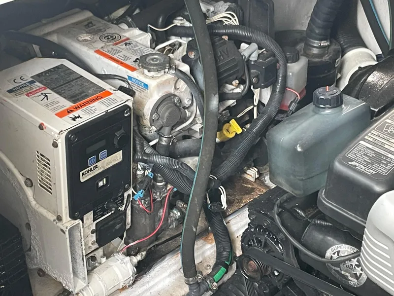 Slide: The Image of Engine compartment of a 2014 Sea Ray 370 Sundancer boat. - 30