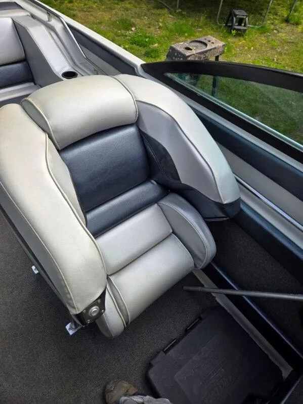 Slide: The Image of 1986 Formula 242 LS boat interior with gray and black seating. - 13