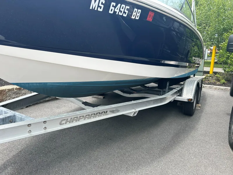 Slide: The Image of 1986 Formula 242 LS boat on Chaparral trailer, parked on pavement. - 15