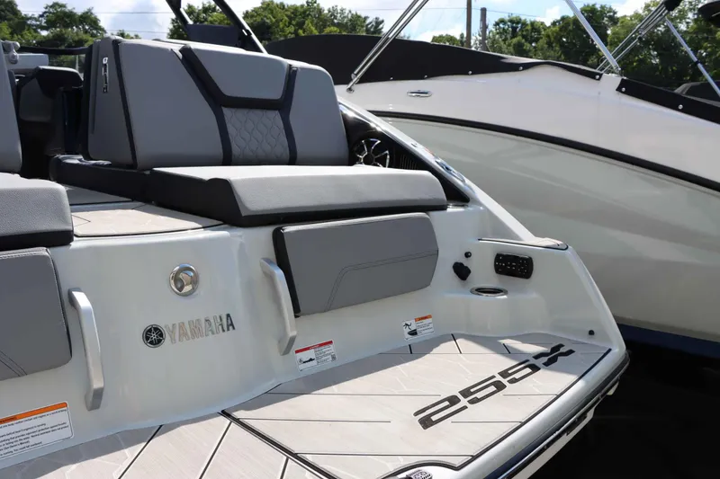 Slide: The Image of 2024 Yamaha Boats 255XE, sleek design with comfortable seating and modern features. - 18