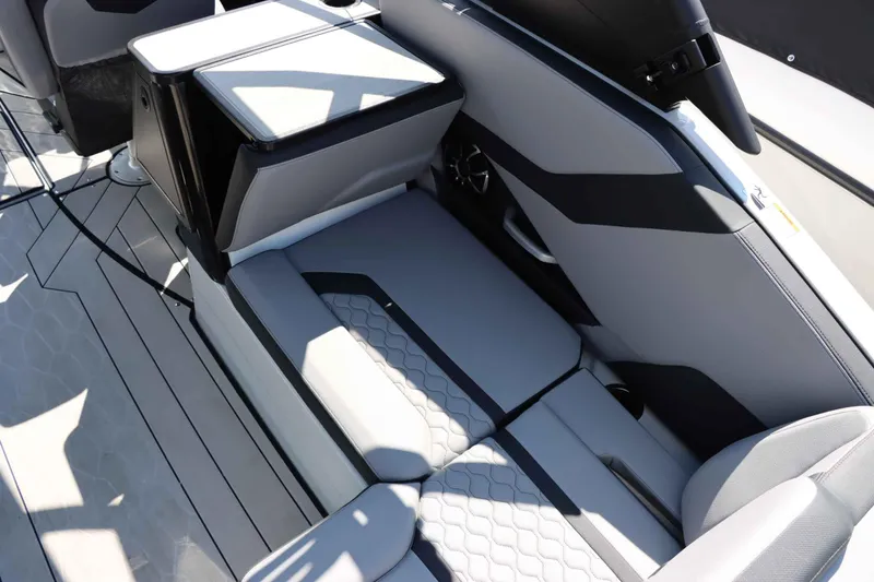 Slide: The Image of 2024 Yamaha Boats 255XE interior seating with modern design and premium materials. - 29