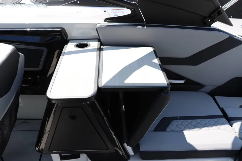 Slide: The Image of 2024 Yamaha Boats 255XE interior with sleek seating and modern design. - 30