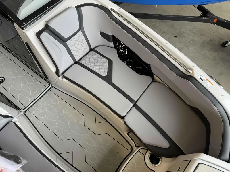 Slide: The Image of 2024 Yamaha Boats 255XE interior seating and flooring. - 9