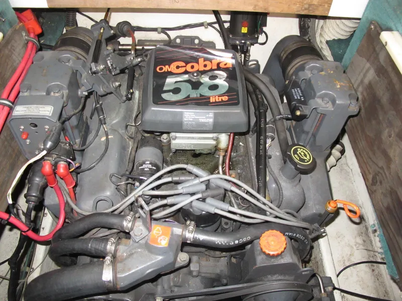 Slide: The Image of 1992 Chris-Craft 228 Concept Cuddy OMC Cobra 5.8L engine in boat compartment. - 11