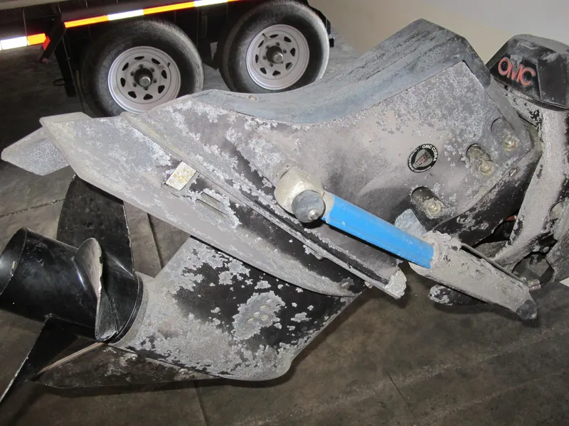 Slide: The Image of Close-up of a 1992 Chris-Craft 228 Concept Cuddy boat's outdrive. - 12