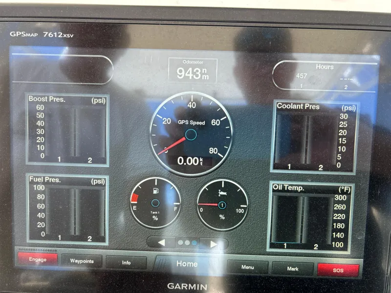 Slide: The Image of Garmin GPSMAP 7612xsv display showing speed, boost pressure, fuel pressure, coolant pressure, and oil temperature. - 11